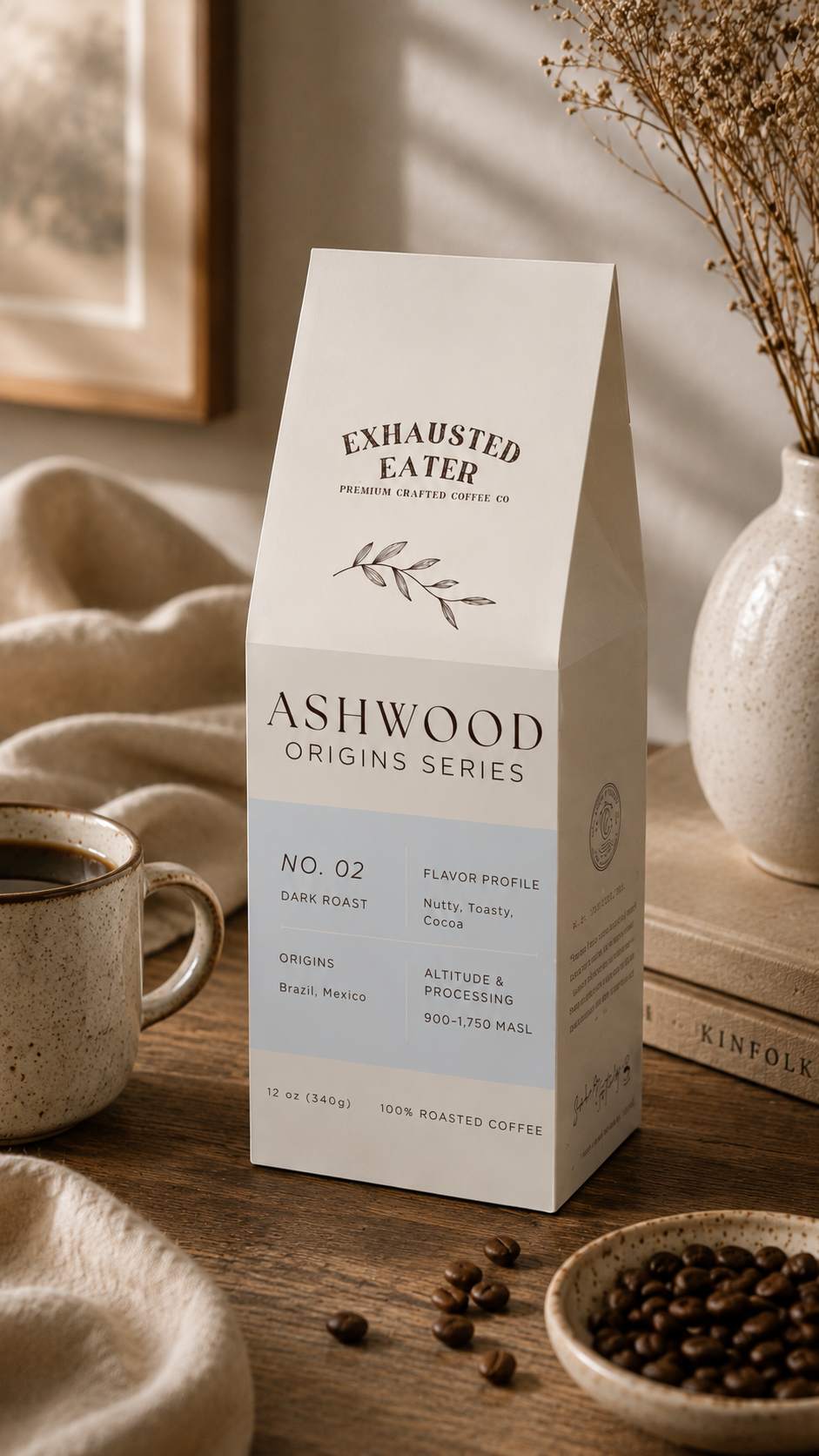 Ashwood Origins Series coffee package on a wooden table with coffee beans and a cup